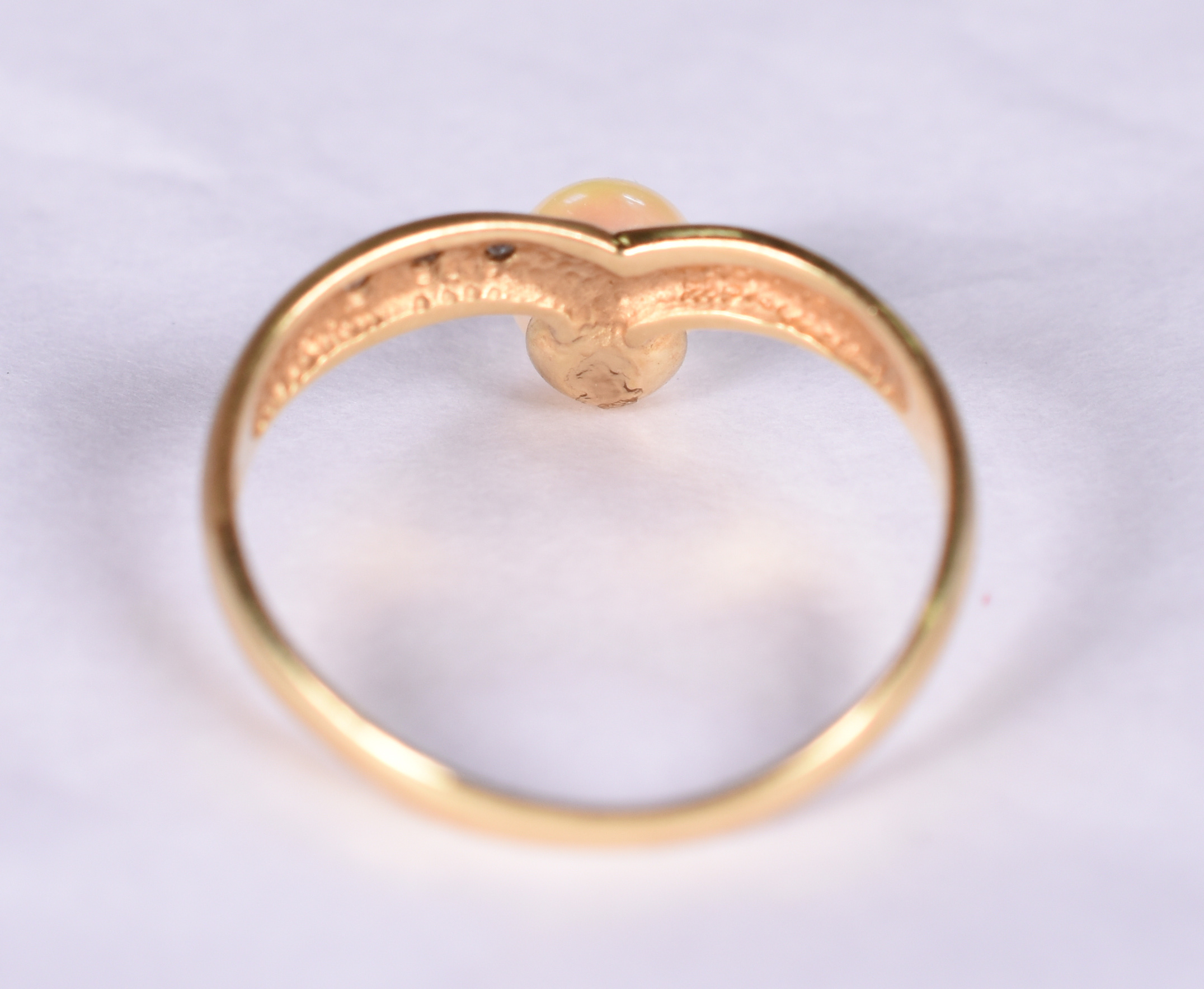 Anel de ouro amarelo 18 k com pérola e 3 brilhantes. H. Stern. Aro 16. - foto 4 de 4