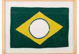 Raul Mourão (1967),  - Raul Mourão.The New Brazilian Flag # 2 (2019). Tecido colado s/ papel, ass. titulado no verso e numerado x/666 no verso da bandeira. 22 x 32,5cm
