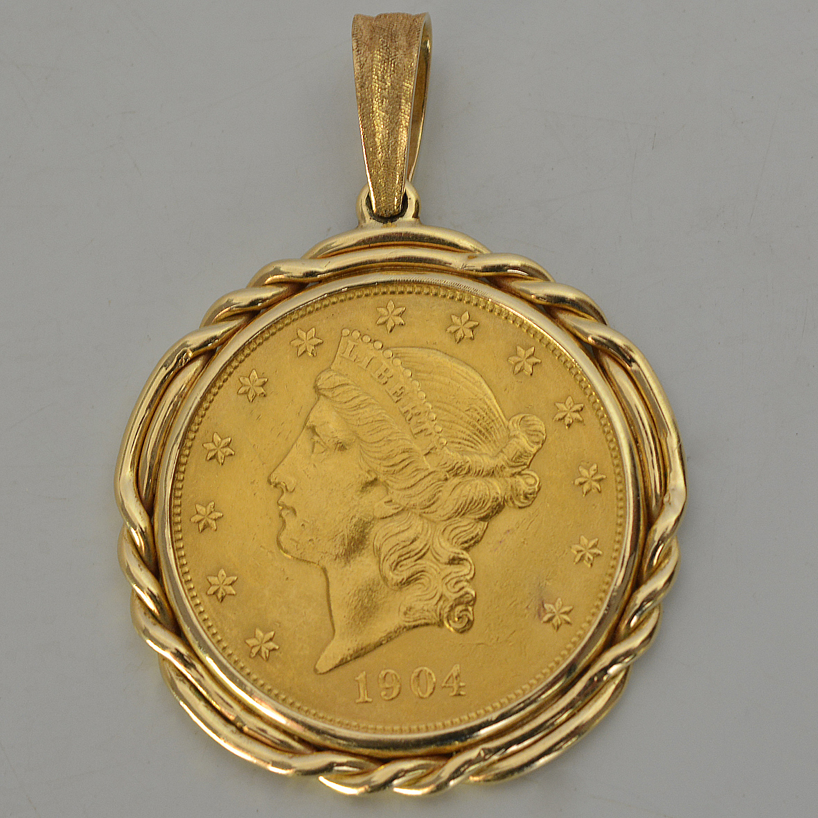 United States twenty dollar coin 1904, peso total aproximado 43.9 g... - foto 1 de 2