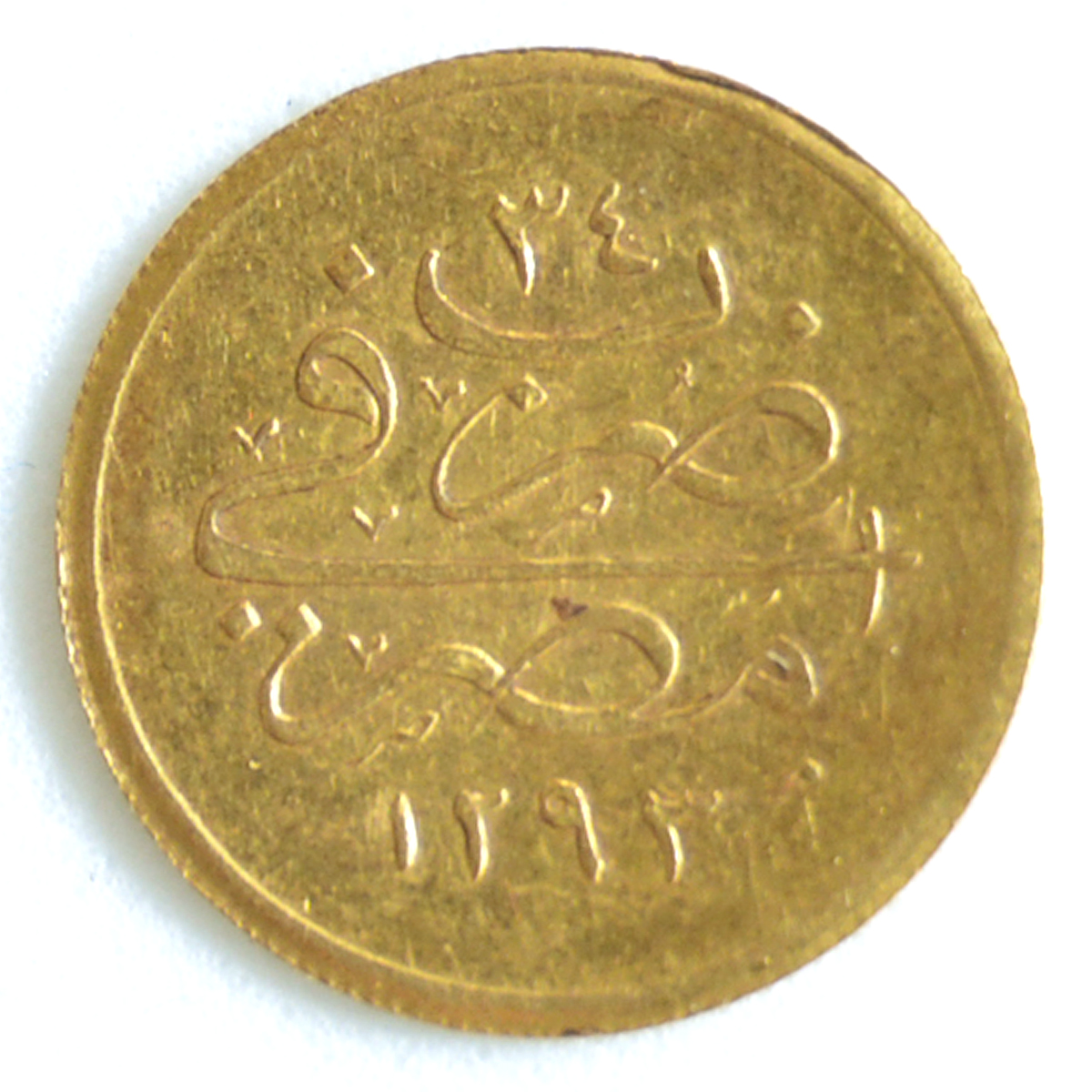 Numismática - Moeda em ouro possivelmente Turca. Peso 0.38 g. - foto 1 de 2