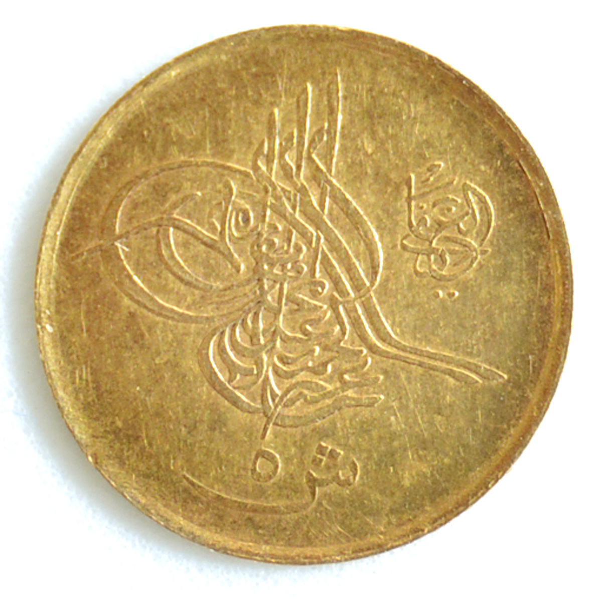 Numismática - Moeda em ouro possivelmente Turca. Peso 0.38 g. - foto 2 de 2