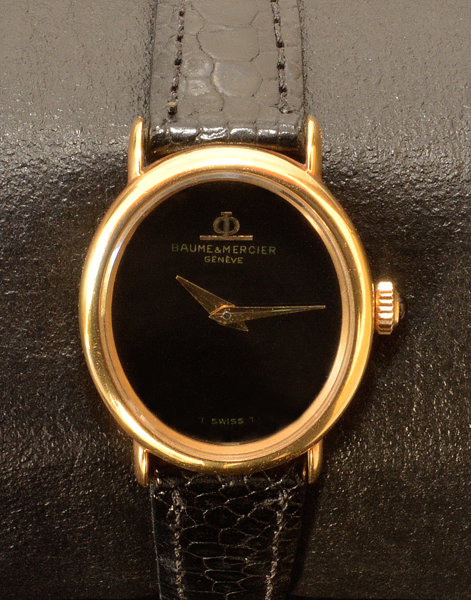 BAUME & MERCIER - Relógio em ouro amarelo, apresenta coroa encimada... - foto 1 de 2