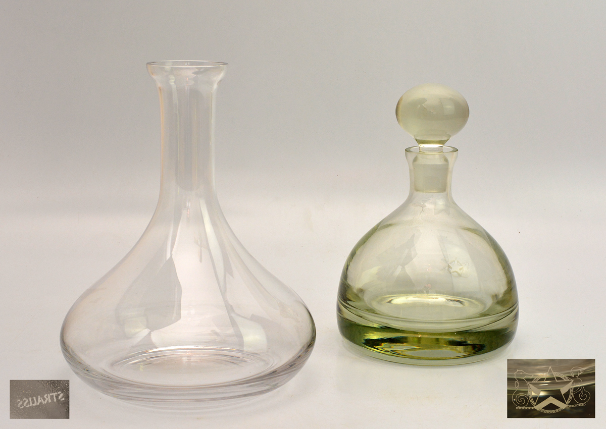 Duas peças em cristal, sendo um decanter Strauss medindo 21 cm por 26...