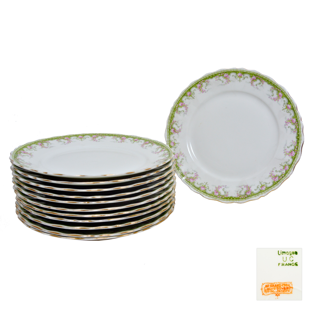 Lote de 11 pratos de sobremesa em porcelana de Limoges apresentando...