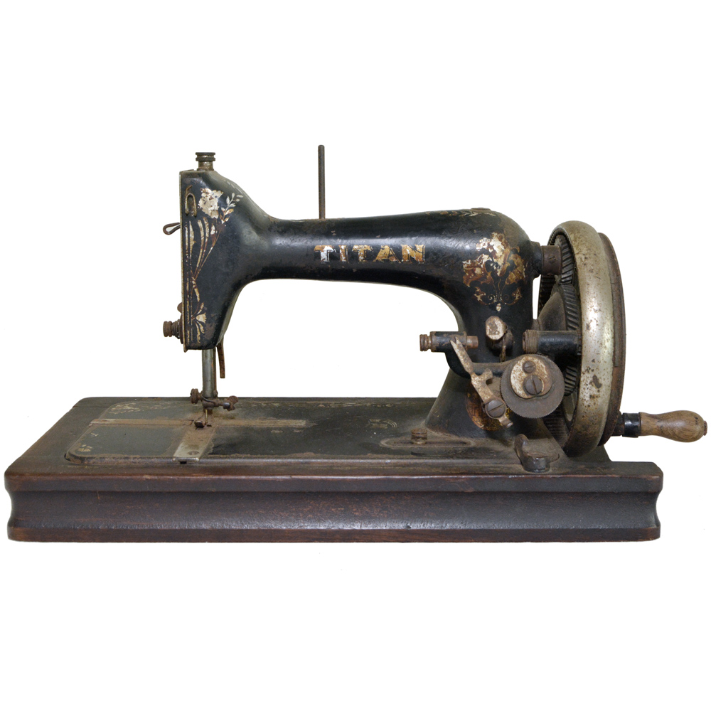 Antiga máquina de costura de manivela.
