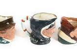 Royal Doulton (1815),  - Lote composto por 3 canecas de coleção em cerâmica inglesa ricamente policromada<br>Representando "Grammy / Paddy / Draure" <br><br><br>O lote encontr