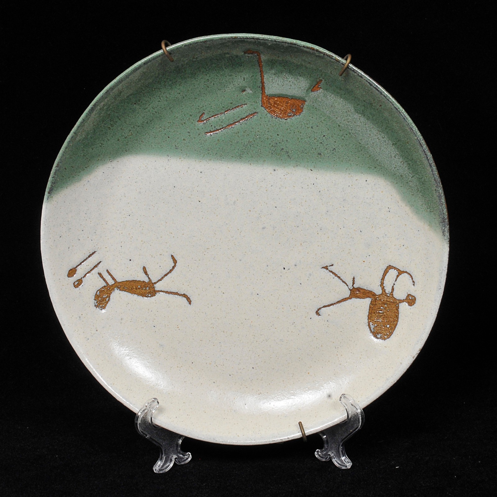 Conjunto de 3 pratos em porcelana com decoração rupestre nos tons... - foto 7 de 7