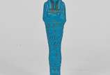 Escultura egipicia em resina pintada de azul tu... - Escultura egipicia em resina pintada de azul turquesa representando Faraó com incrisões em hieroglifos medindo 20 cm com base.<br><br>Lote não e...