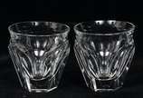 Baccarat (1764),  - Baccarat - Lote composto de 8 copos para licor em cristal francês translúcido com bojo facetado.<br>Peça marcada na base.<br><br>Por questões de segur
