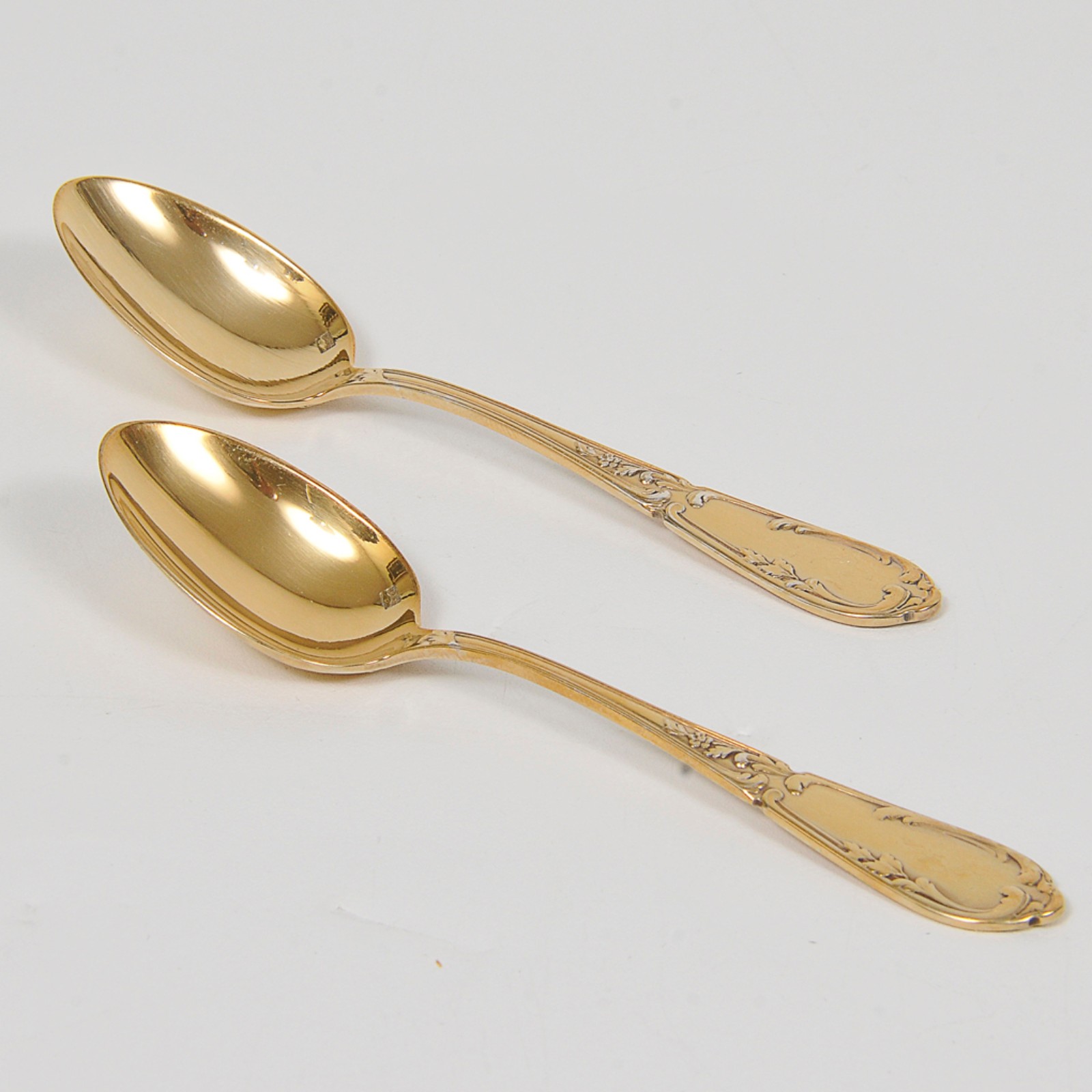 Conjunto de 12 colheres para café em metal dourado com cabos... - foto 3 de 3