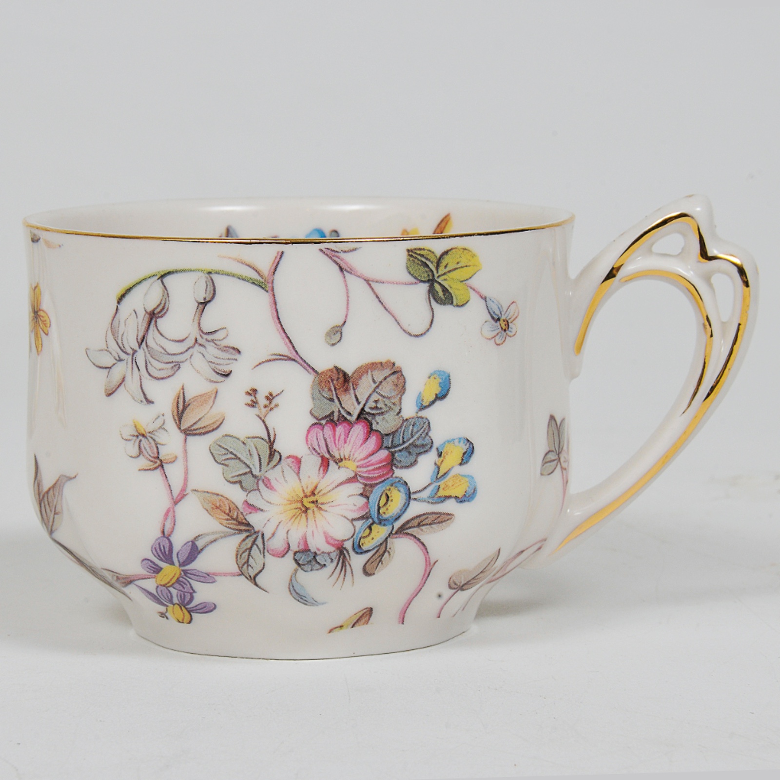 Conjunto com 4 xícaras com pires para chá em porcelana nacional grife... - foto 5 de 6