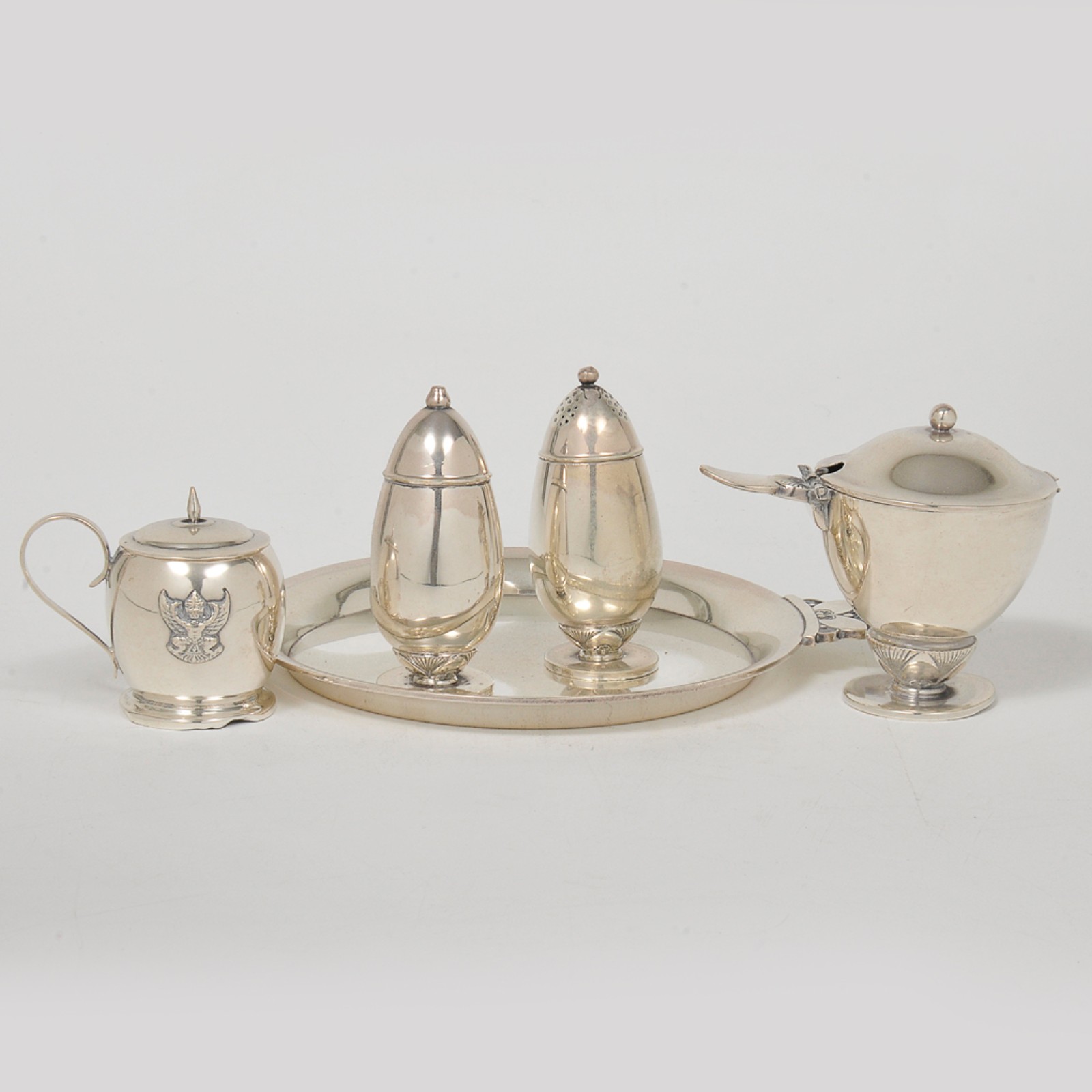Georg Jensen - Conjunto de peças de mesa em prata dinamarquesa lisa... - foto 1 de 8