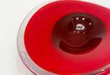 Cinzeiro em vidro artístico de Murano na cor ve... - Cinzeiro em vidro artístico de Murano na cor vermelho e magenta com design oval, Déc.80.<br>Ex - Coleção Carlos Ferreira