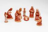 VALE DO JEQUITINHONHA, Presépio - Presépio em arte popular da região do Vale do Jequintonha composto por 9 esculturas em terracota policromada decorada com flores nas cores branca e ma