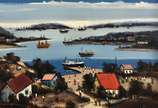 Sylvio Pinto (1918-1997), Marinha com barcos - Óleo s/ tela<br>Ass. inf. direito 
