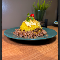 Cuscuz de carne com queijo 