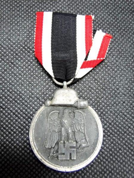 Alemanha Nazista, III Reich, II Guerra Mundial, medalha original déc. 40 mostrando a Águia e Suásti