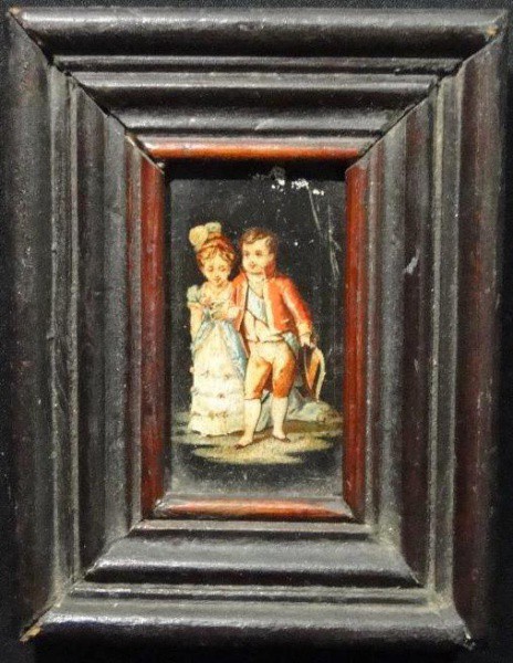 Porta retrato em maderia com imagem de crianças. Aprox. 17 x 12 cm