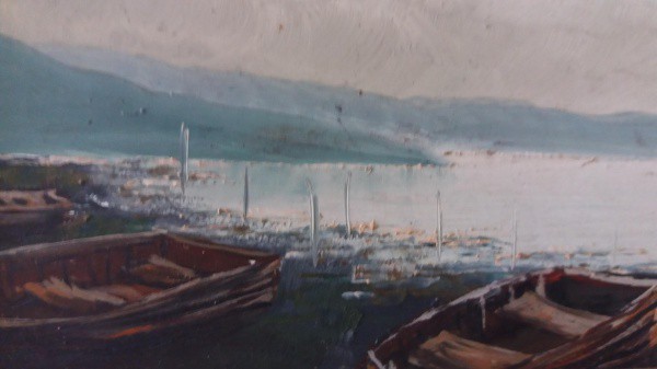 Assinatura não identificada, OSE, 10 x 16 cm (com moldura 25 x 33 cm), representando barcos na orla.