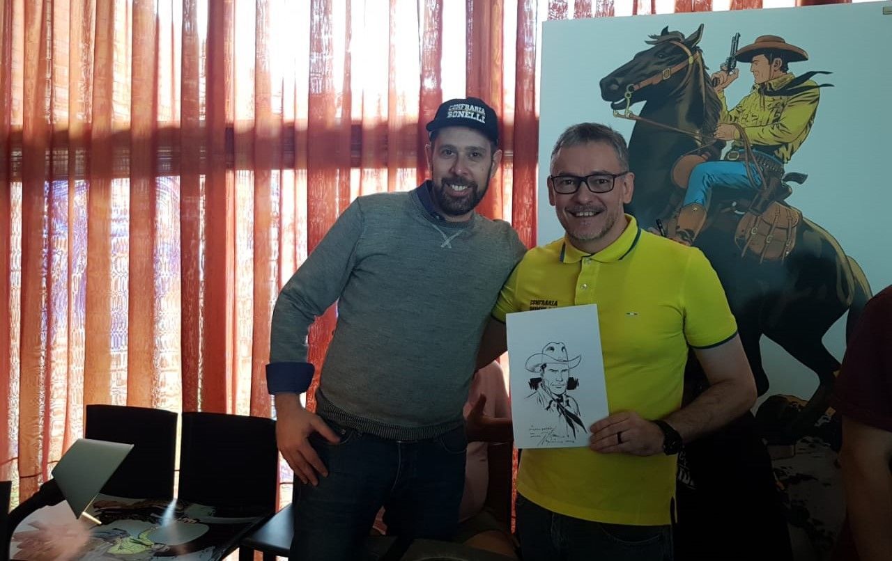 Alessandro Nespolino (SBE) e Ricardo Elesbão (Confraria Bonelli) durante a Mostra do Clube Tex Portugal em 2018;