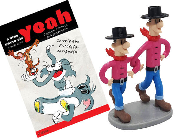 Revista e duas bonecas