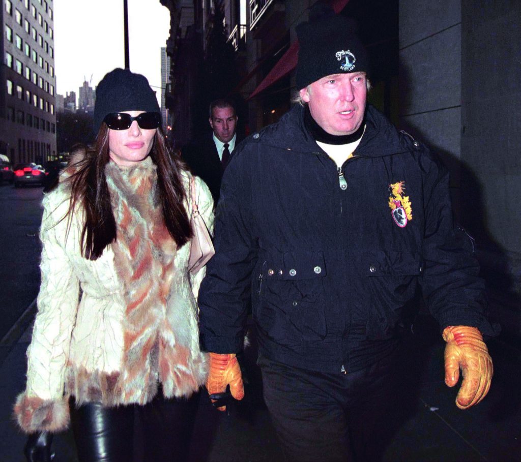 ©QUEEN INTERNATIONAL Ref: SP/LSNY 050102 A bundled up Donald Trump and girlfriend Melania Knauss exit Barney