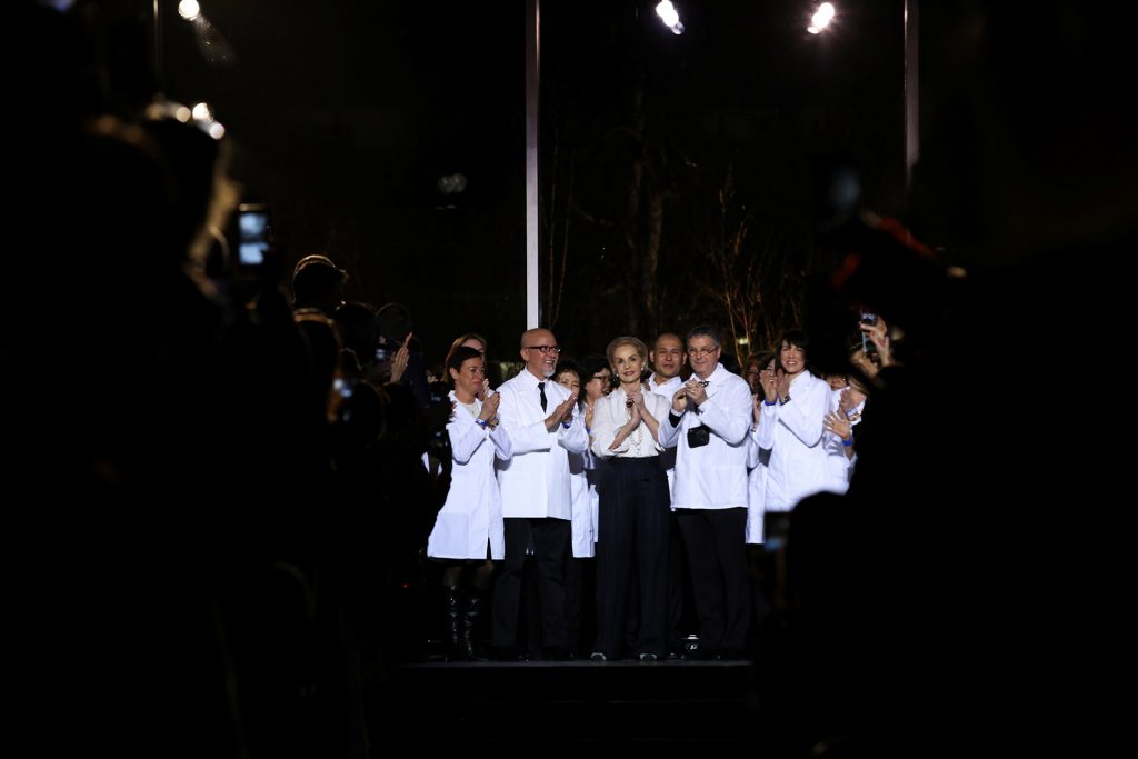 Designer Carolina Herrera and team members receive applause after presenting the Fall/Winter Women