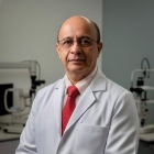 Dr. Alfonso Cáceres Mancilla