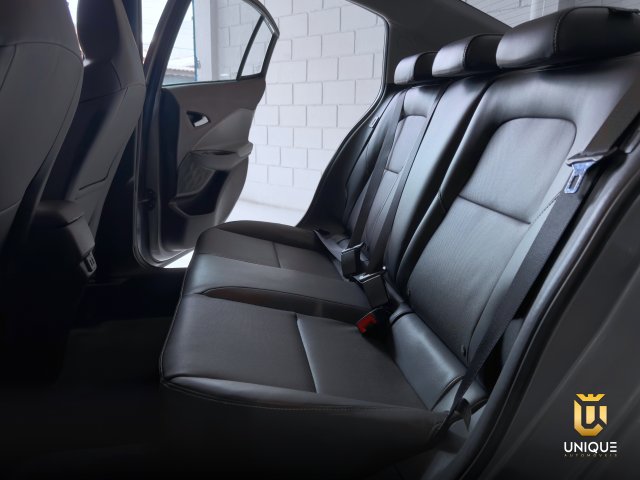 Chevrolet Onix 1.0 TURBO FLEX PREMIER AUTOMÁTICO 2024/2025 cinza à venda na Unique Automóveis em Indaiatuba — foto 19