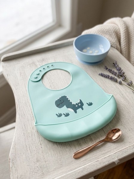BABADOR EM SILICONE GAUCHA BABY - MODELO: DINOSSAURO