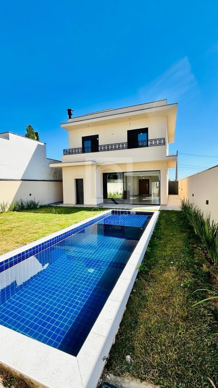 Casa de Condomínio à venda com 4 quartos, 225m² - Foto 1