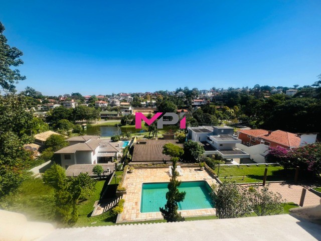 Casa de Condomínio à venda com 3 quartos, 400m² - Foto 1