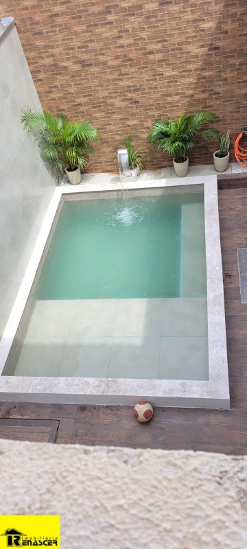 Casa de Condomínio com 3 quartos à venda, 140m² — foto 2 de 34