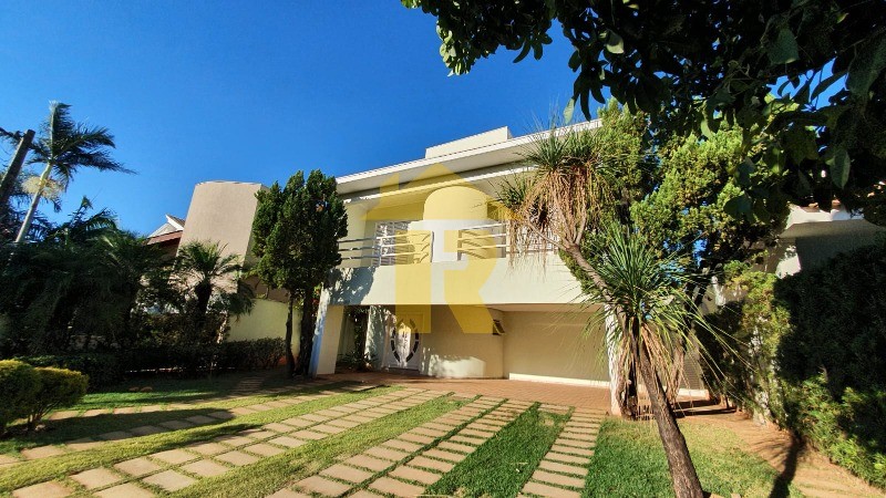 Casa de Condomínio com 4 quartos à venda e aluguel, 446m² — foto 2 de 58