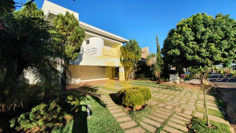 Casa de Condomínio com 4 quartos à venda e aluguel, 446m² — foto 4 de 58