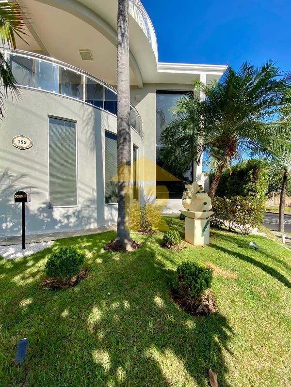 Casa de Condomínio com 5 quartos à venda e aluguel, 404m² — foto 2 de 43
