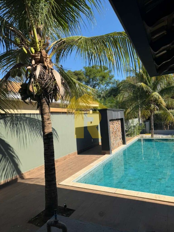 Casa de Condomínio com 4 quartos à venda, 560m² — foto 4 de 33