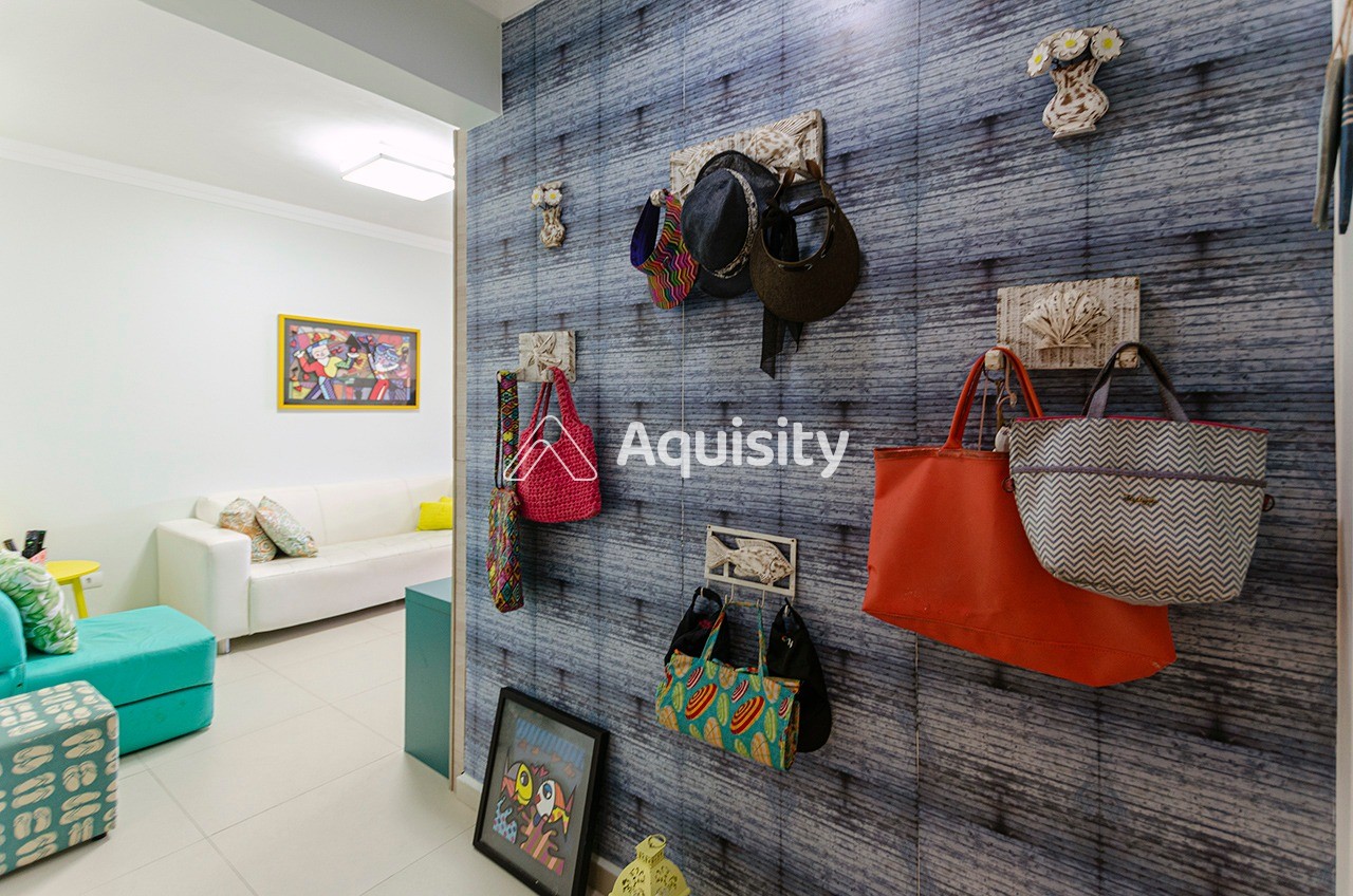 Apartamento Garden à venda 207m² Guarujá 3 suítes Sala 2 ambientes Varanda gourmet Quintal 3 vagas Cozinha americana Ar condicionado 60m da praia