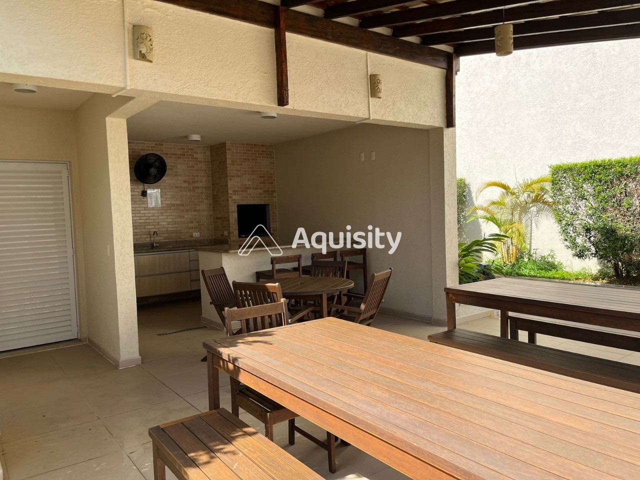 Apartamento Garden à venda 207m² Guarujá 3 suítes Sala 2 ambientes Varanda gourmet Quintal 3 vagas Cozinha americana Ar condicionado 60m da praia