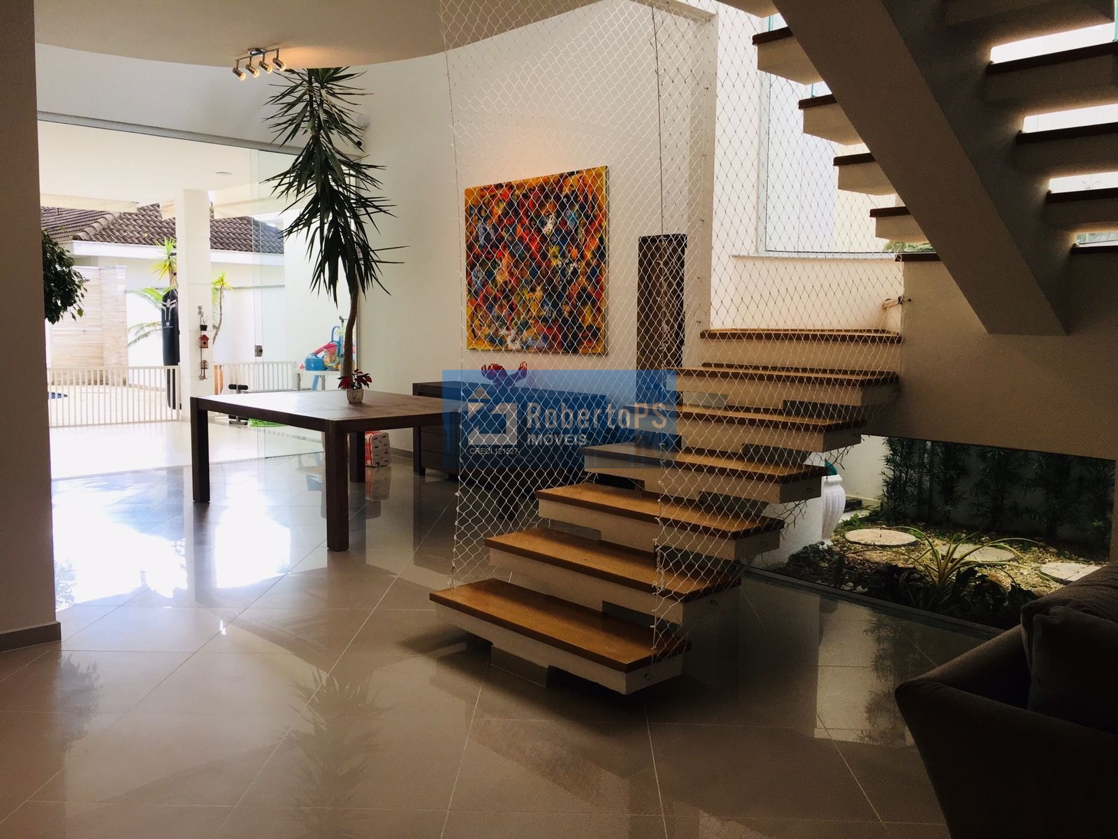 Lindo sobrado em condomínio com 5 suítes aquecimento solar e 4 vagas