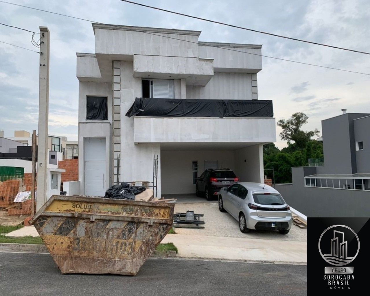 Casa com 3 dormitórios à venda, 220 m² por R$ 1.224.000 - co
