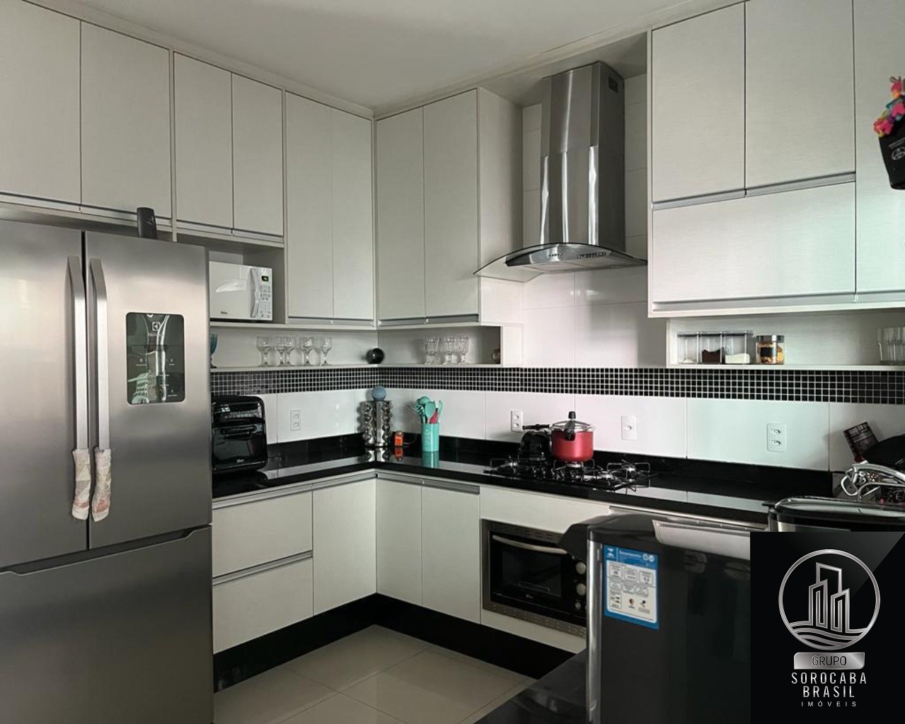 Casa com 3 dormitórios à venda, 110 m² por R$ 636.000 - lote