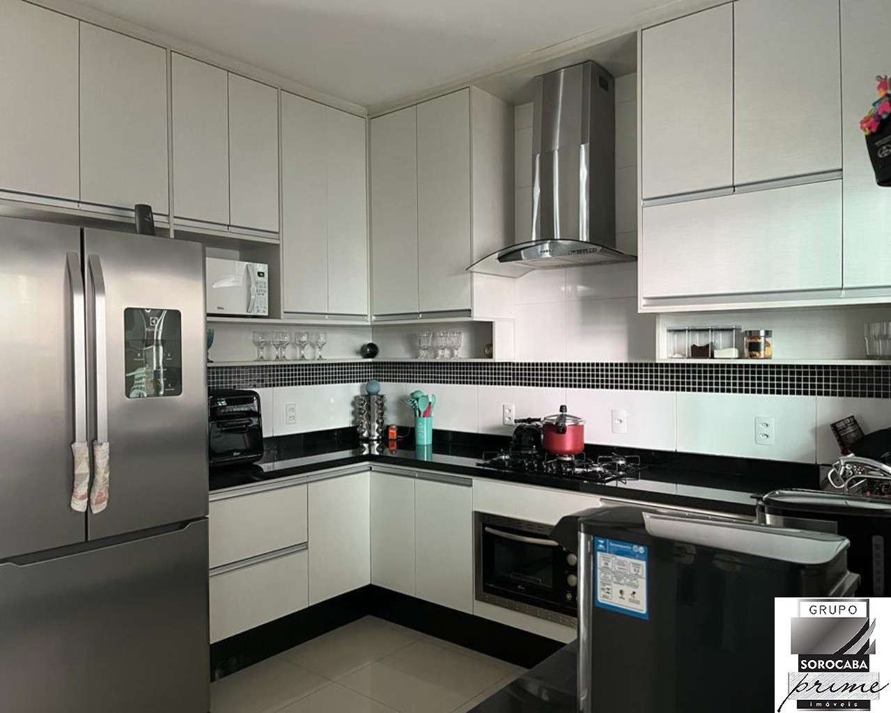 Casa com 3 dormitórios à venda, 110 m² por R$ 636.000 - lote