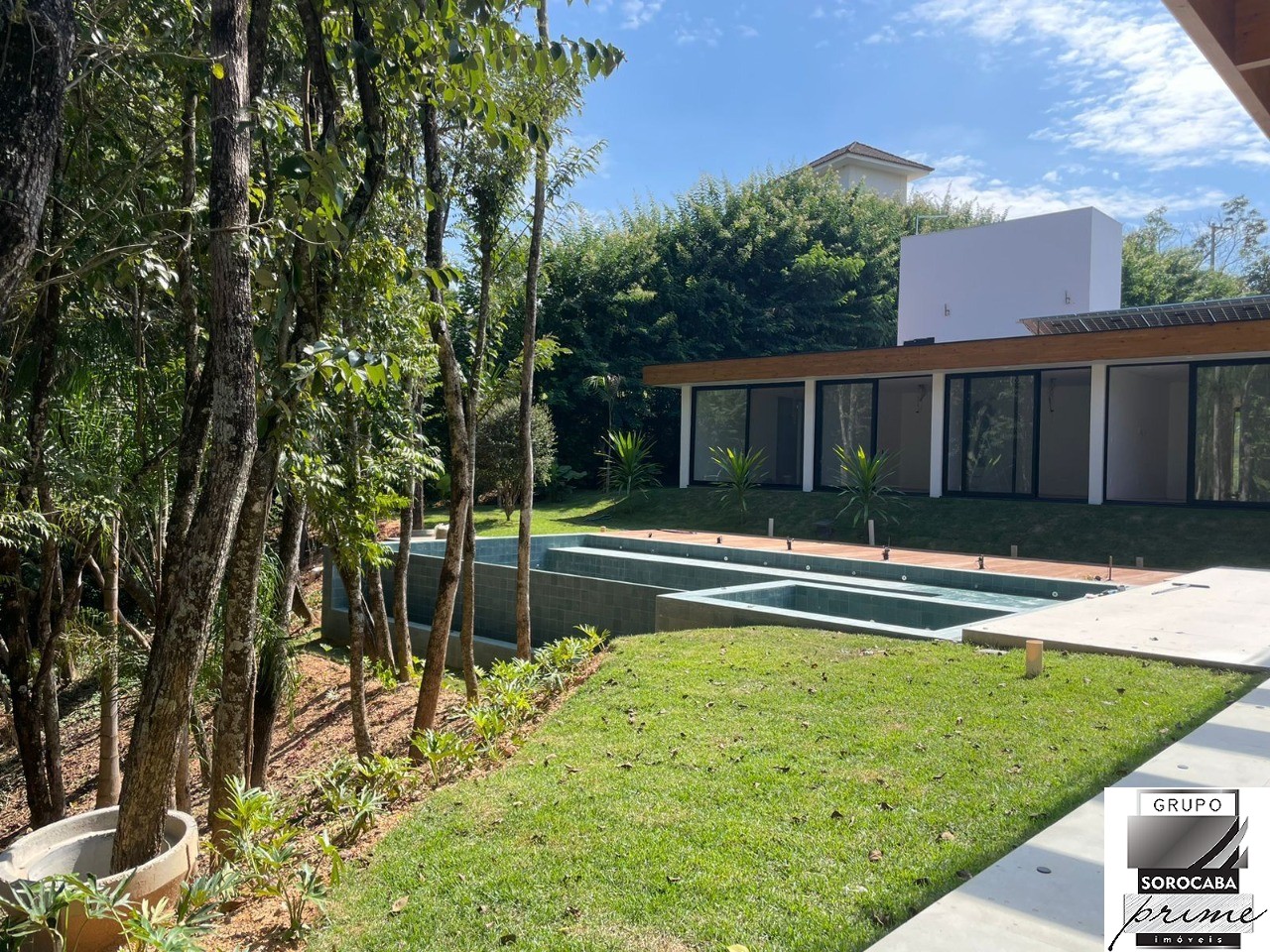 Casa com 5 suítes à venda, 630 m² por R$ 9.900.000 - condomí
