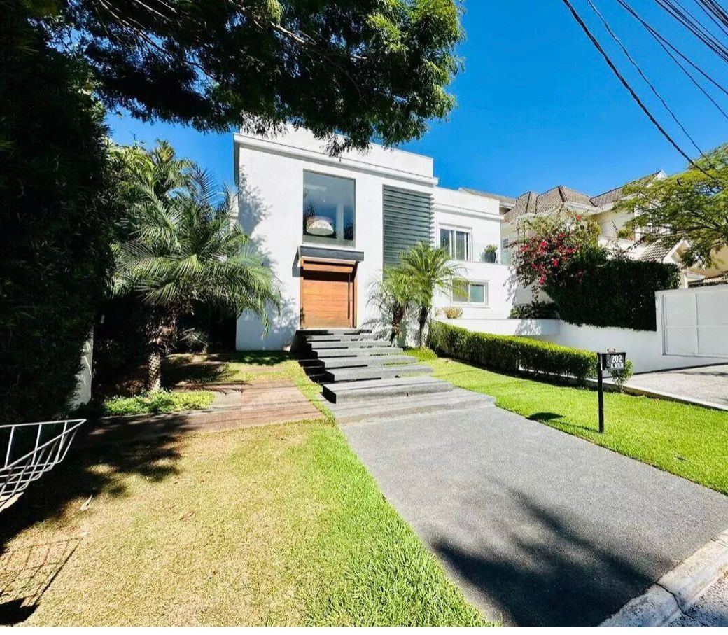 Casa sobrado com piscina localizada no alphaville residencia