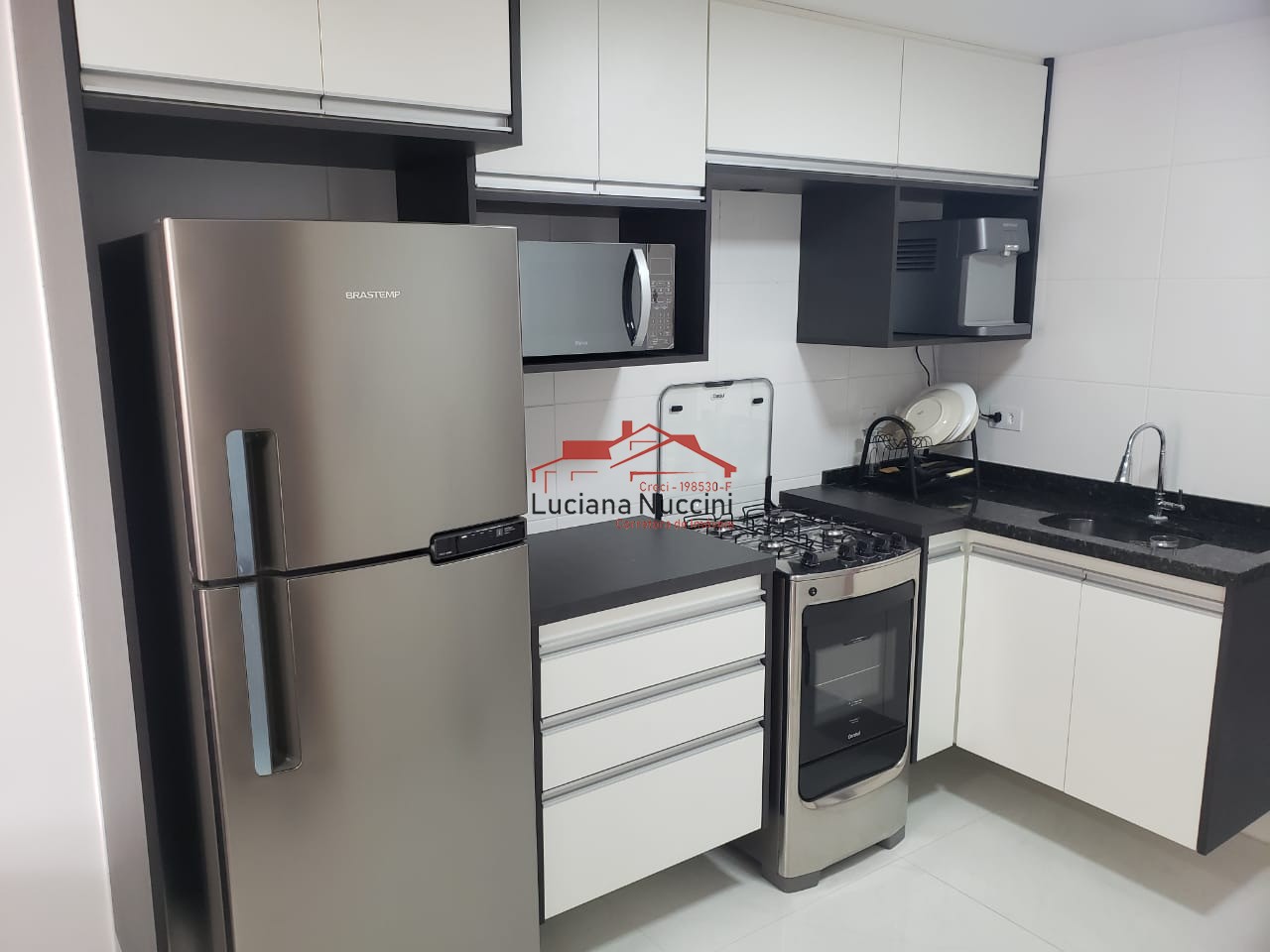 Apartamento Espaçoso com 2 Dormitórios e Cozinha Planejada: Conforto e Funcionalidade em 52 m²