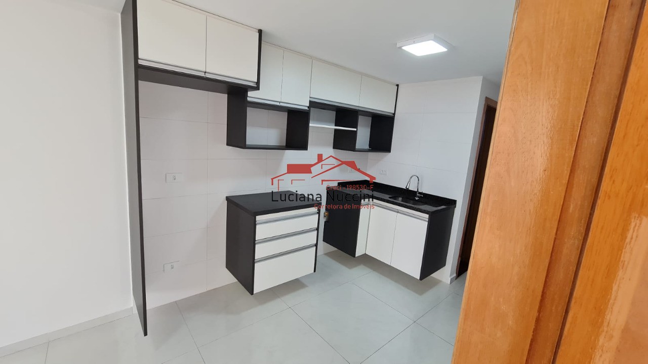Apartamento Espaçoso com 2 Dormitórios e Cozinha Planejada: Conforto e Funcionalidade em 52 m²