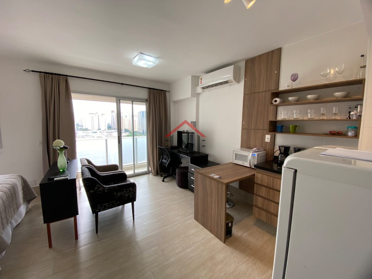 Studio de luxo em condomínio exclusivo em Santo Amaro, São Paulo - 1 quarto, 1 banheiro, 1 vaga - 33m² de elegância!