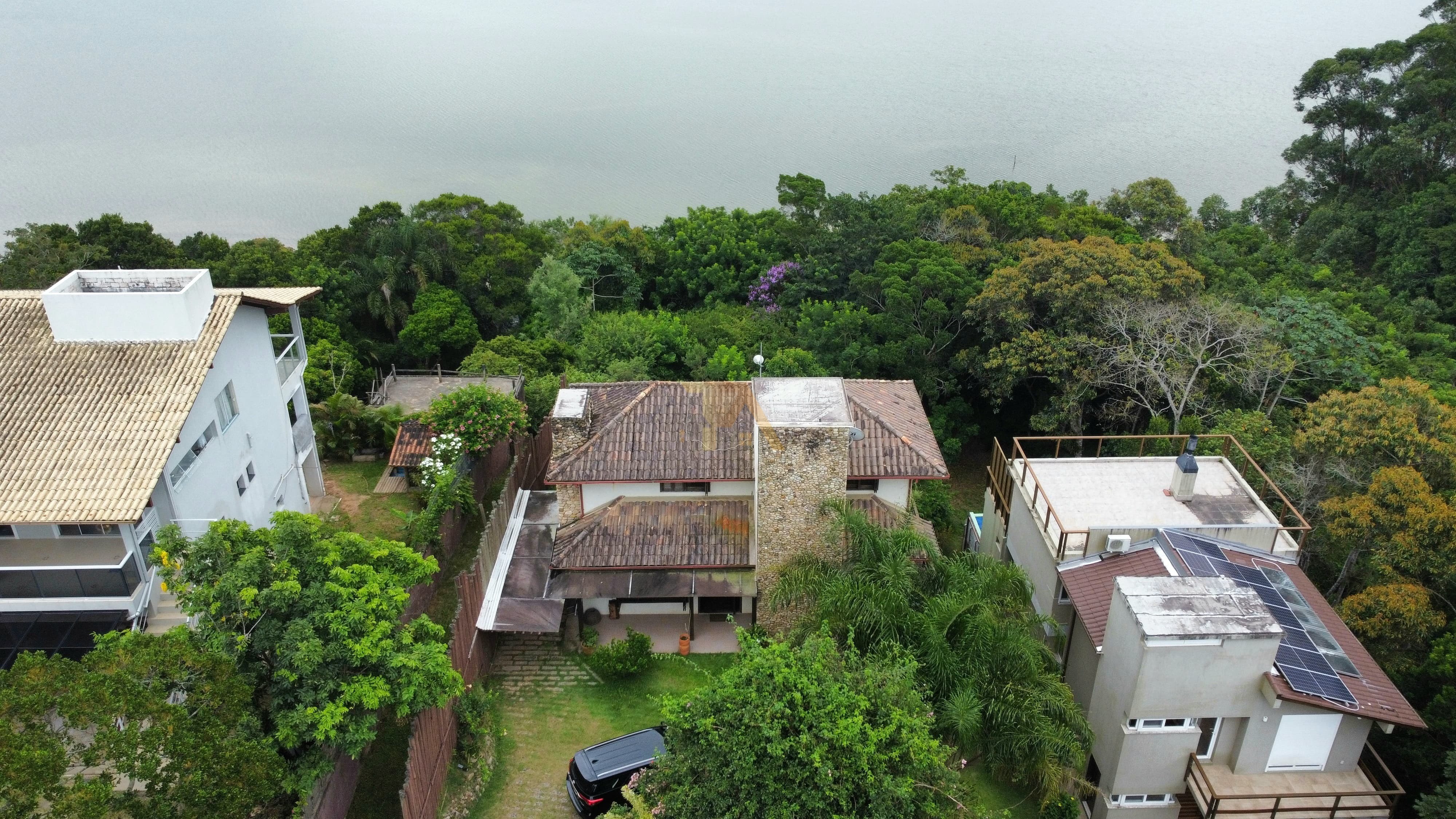 Casa com Piscina e acesso à Lagoa da Ibiraquera Residencial Praia do Rosa