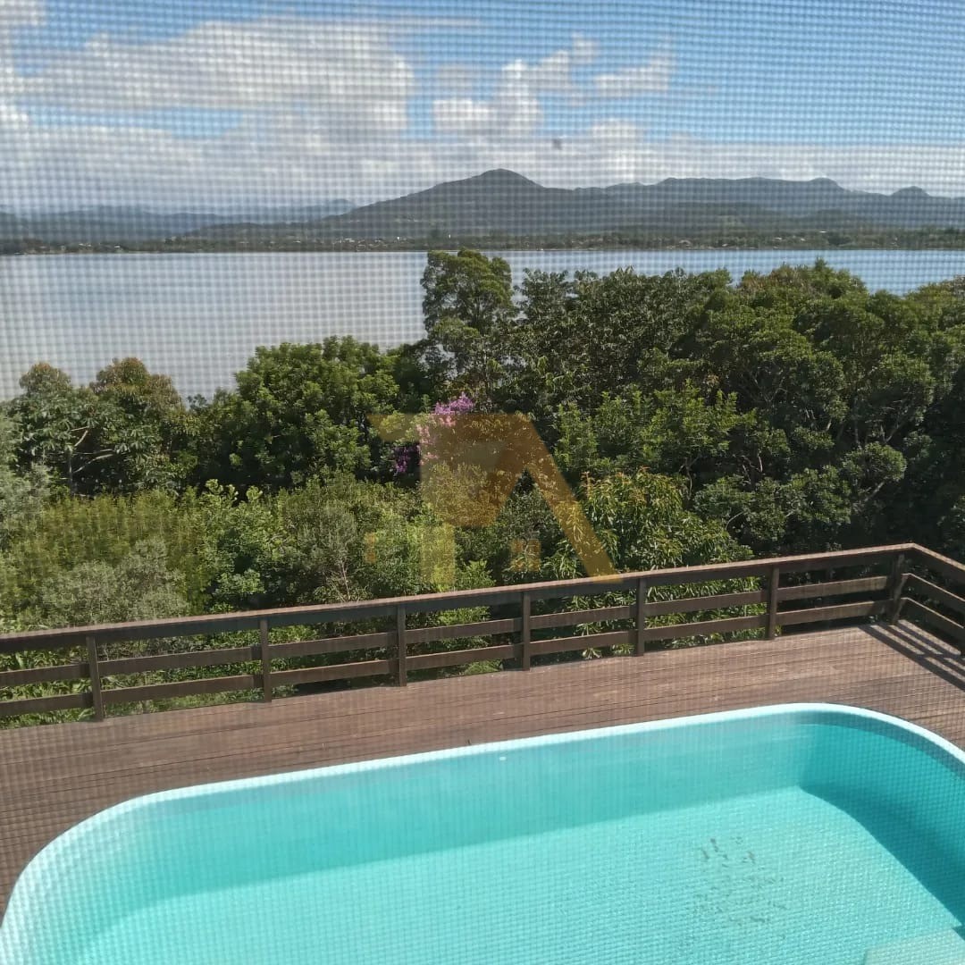 Casa com Piscina e acesso à Lagoa da Ibiraquera Residencial Praia do Rosa